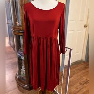 Elegant Burnt Red Women's Babydoll Dress with Stretch.